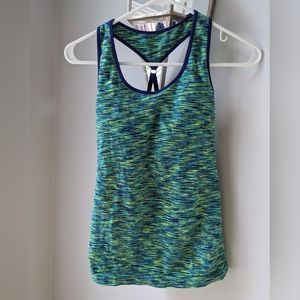 Women's athletic tank. Built in bra. Adjustable straps. Size Small.